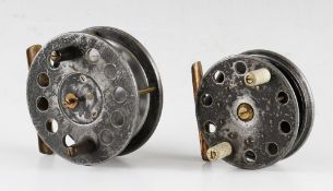 2x similar style black alloy trout fly reels - 3.5