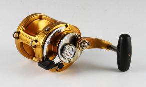 Penn International II 16 S Big Game Fishing Reel in gold, lever drag, marked I990580, made in U.S.