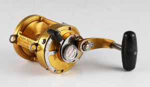 Penn International II 12 LT Big Game Fishing Reel in gold, lever drag, marked E990084, made in U.S.A