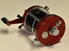 ABU Ambassadeur 7000 Multiplier Fishing Reel in red with chrome frame, marked 741100, counter