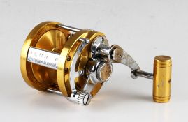 Vintage C.1980s Penn International 6 Big Game Fishing Reel in gold, lever drag, marked 4.056.246,