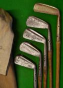 5x Maxwell golf clubs - an iron. 2x mid irons, mashie and a putter in a good canvass and leather