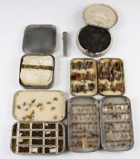 Collection of various period fly and cast tins and assorted flies and oiler (5) - W Cummins Alloy