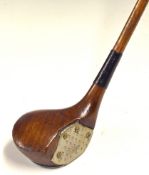 Silver Dint Driver: A dark stained beech wood with silver insert and full sole plate showing the