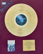 Andrew Lloyd Webber Award - A mounted and framed in house presentation disc, presented to Peter