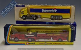 Corgi Toys American LaFrance Aerial Rescue Truck 1143 Diecast Model in red and yellow together