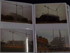 Album of photographs depicting Old Trafford football ground in various stages of demolition/