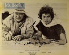 Autographs – John Wayne (1907-1979) and Sophia Loren (b.1934) Signed Photograph depicts a still