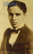 Autograph – Charlie Chaplin (1889-1977) Signed Photocard depicting a portrait view of Chaplin,