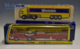Corgi Toys American LaFrance Aerial Rescue Truck 1143 Diecast Model in red and yellow together