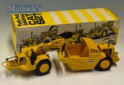 NZG Caterpillar Push-Pull Scraper No 127 Diecast Model Toy Cat 627 in yellow with original box,