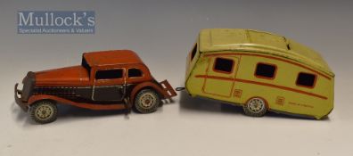 Clockwork Tinplate Mettoy Toy Saloon Car and Caravan - car in red and black trim, the caravan in