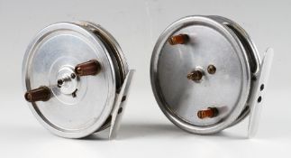 2x interesting 4” alloy centre pin reels: one with a brass slater style drum release latch and