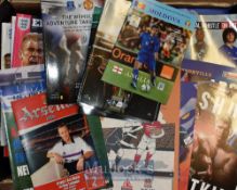 Large box of different big occasion sporting programmes mainly football including European