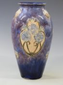 Royal Doulton vase with incised flower decoration. MB to base, probably Maude Bowden, 30cm