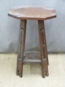 Arts and Crafts / Art Nouveau oak octagonal side table with pierced decoration to legs, W48 x H68cm