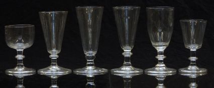 Six various 19thC and later clear drinking glasses, all with knopped stems, raised on folded feet,
