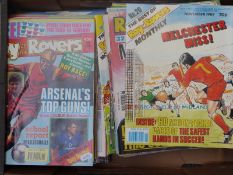 A collection of Roy of the Rovers comics and annuals