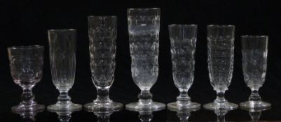 Seven 19thC and later clear cut glass vases or large goblets some in matching patterns, largest 23cm