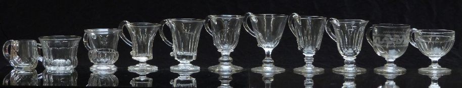 Eleven 19thC and later cut glass handled cups, largest 9.5cm tall.