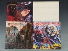 Approximately 50 LPs including Iron Maiden (4), Mike Oldfield (9), Black Sabbath (2), Pink Floyd etc