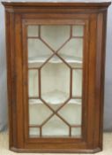 18th or 19th century oak or elm astragal glazed corner cupboard, height 132cm