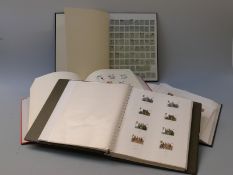 Three albums of GB QEII stamps mint and used, high redeemable value and stockbook of early British