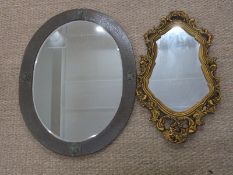 Gilt framed shaped mirror, height 70cm and a further bevelled edge mirror