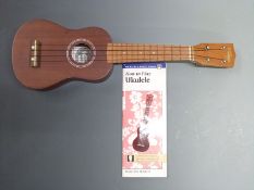 Ukulele by 'Vintage' indark wood finish, with How to Play guide