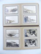 Two photograph albums c1923, beginning with Opobo, Nigeria and including shipping scenes, the