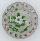 Baccarat faceted glass garlanded flower paperweight decorated with a central white clematis with