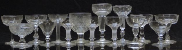 Fifteen 19thC and later clear cut glass pink champagne or similar glasses, largest 16cm tall.