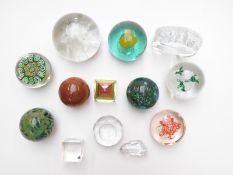 Thirteen glass paperweights including Mdina etc, one in original box.