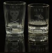 Two 19thC drinking glasses each with compartments to the bases containing dice, one engraved to