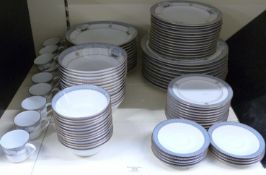 Noritake dinner and tea set decorated in the High Seas pattern, eight place settings with extras,