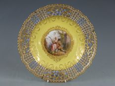 Meissen cabinet plate, reticulated surround with flower decoration, Watteau scene to the centre