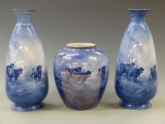 Crown Devon garniture comprising two pedestal vases and a baluster shaped example signed Cox and