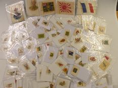 A collection of Kensitas, BDV and other cigarette silks, includes flags, military examples etc
