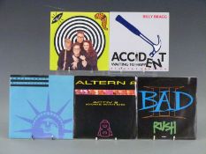 Approximately 280 singles, mostly 1980's, in a case