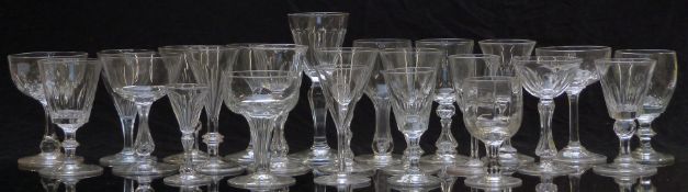 Twenty four 19th century and later drinking glasses including ale and champagne glasses etc, largest