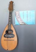 Carlo Overi and Figlio 19thC round back Napolese mandolin with floral and foliate decoration to