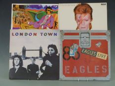 Approximately 20 albums of mixed genres including Bob Dylan, Wings, The Eagles and David Bowie