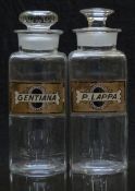 A pair of chemists/ pharmacy glass apothecary bottles with gilt labels for Gentiana and P. Lappa,