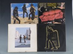 Approximately 25 albums including Frank Zappa, Pink Floyd and Led Zeppelin