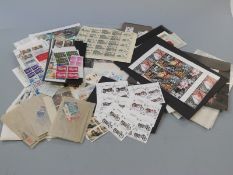A box file of QEII mint GB stamps, singles blocks and part sheets
