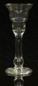 Georgian clear wine glass with flared double ogee bowl and controlled air bubble stem, 17.5cm tall.