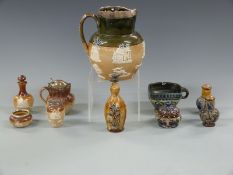 Royal Doulton jugs, cruets and salts, pottery cup marked Liberty to base, some with hallmarked