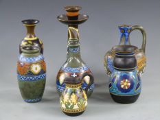 Gouda pottery vases, ewers, guglet and a large candlestick, tallest 29cm