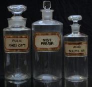 Three chemists/ pharmacy glass apothecary bottles with gilt labels including Acid Sulph Ar and