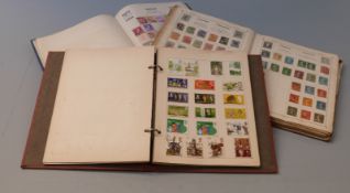 Three albums of all world stamps